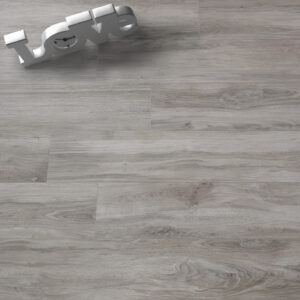 Lignum Grigio porcelain tile lifestyle image with the word "love"